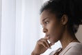 Close up pensive african woman thinking of problem solution. Royalty Free Stock Photo