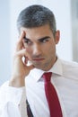 Close-up of pensive Businessman looking off camera Royalty Free Stock Photo