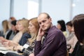 Close up.pensive businessman during a press conference Royalty Free Stock Photo