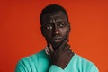 Close up of a pensive worried african man isolated Royalty Free Stock Photo