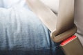 Close Up of people man hand fastening seat safety belt in car Royalty Free Stock Photo