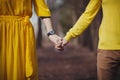 Close-up of people`s hands. A man and a woman hold hands Royalty Free Stock Photo