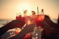 Close up of people toasting with alcoholic drink on a beach, created with Generative AI technology. Royalty Free Stock Photo