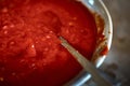 Close up of peppers being crushed in a mortar Royalty Free Stock Photo