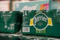 Close up of Perrier carbonated spring water pack in a warehouse. Royalty Free Stock Photo