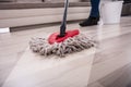 Person Cleaning Floor With Mop Royalty Free Stock Photo