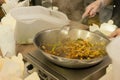 Close Up of Person Cooking Stir Fry in Hot Pan