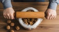 Cracking Walnuts with Rolling Pin: Person Preparing Fresh Nuts, Closeup Royalty Free Stock Photo