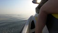 Close up of person driving jet ski in the sea.