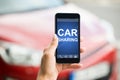 Smart Phone With Car Sharing App On Screen Royalty Free Stock Photo