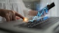 Close-Up of a Person Hand Interacting with a Laptop Screen While Analyzing Financial Data with Graphs and Digital Royalty Free Stock Photo