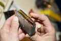 Close up of person holding bullet cartridge