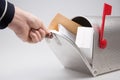 Close-up Of Person open box mail Stack Of Letters and package parcel In Mailbox Royalty Free Stock Photo