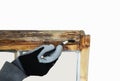 Close up of a person restoring sash windows Royalty Free Stock Photo