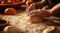 Close-up of a person\'s hands rolling out pumpkin pie dough