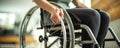 Close-up of a person using a wheelchair