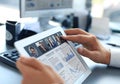 Close up of person video conferencing with colleagues on digital tablet, analyzing financial statistics Royalty Free Stock Photo