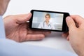 Person Videochatting With Doctor On Mobile Phone Royalty Free Stock Photo