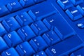 Close up of personal computer keyboard as a background. Toned image. Blue filter. Royalty Free Stock Photo