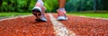 Close up of a persons feet on a tennis court