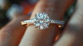 Close Up of Persons Hand Holding Diamond Ring Royalty Free Stock Photo