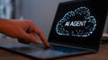 AI Agent on Laptop Screen with User Interaction representing Cloud Technology and Artificial Intelligence Concept Royalty Free Stock Photo