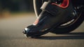 Close Up of Persons Shoe on Bike, Detailing the Simplicity and Functionality of Cycling.