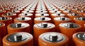 Rows of Orange Cylindrical Batteries in a Repeating Pattern battery power Royalty Free Stock Photo