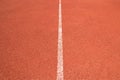 Close up perspective white line of Athletics track in sport stadium