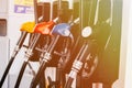 Close up of petroleum gasoline station service - oil refueling and refilling for car transportation concept. Royalty Free Stock Photo