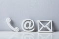 Close-up Of A Phone, Email and Post Icons Royalty Free Stock Photo