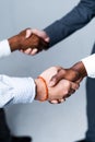 Close up photo. African American businessmen shaking hands at the end of negotiations