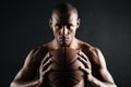 Close-up photo of afro american basketball player holding ball w Royalty Free Stock Photo