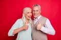 Close up photo amazing funny she her he him his old guy lady hugging best partners thumbs up symbol amazed advising buy Royalty Free Stock Photo