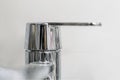 Close up photo of bathroom interior and brand new glittering faucet b Royalty Free Stock Photo