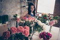 Close up photo beautiful adorable she her lady many roses vases retail seller assistant hands arms check flowers