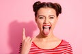 Close up photo beautiful carefree she her lady pretty hairdo two buns bright red pomade big lips tongue out mouth rocker Royalty Free Stock Photo