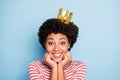 Close up photo of beautiful dark skin wavy lady in best mood cheerfully smiling wear amazing golden crown casual striped Royalty Free Stock Photo
