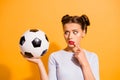 Close up photo beautiful hairdo she her lady judge referee hold raise hand arm leather ball finger chin mouth hate