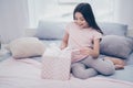 Close up photo beautiful she her little girl sitting bed sunday morning hold opening present box best day ever wear home Royalty Free Stock Photo