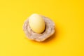 Close up photo of birds nest easter eggs over yellow background Royalty Free Stock Photo