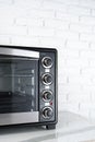 Close up of black mini electric oven home appliance