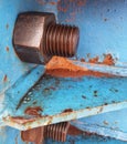 Close up photo of bolt and nut connection that joins steel plate for launcher gantry