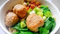 close up photo of a bowl of beef meatballs