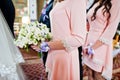 Close-up photo of a bridesmaid holding a bouquet of flowers in t Royalty Free Stock Photo