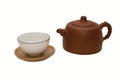 Close-up photo of brown teapot with teacup Royalty Free Stock Photo