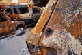 Bullet holes in burned car shell in Ukraine Royalty Free Stock Photo