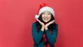 Close up photo of charming lady with santa hat smiling wear stylish good look isolated over red background Royalty Free Stock Photo