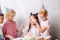 Close up photo. children want to congratulate their best friend with anniversary Royalty Free Stock Photo