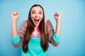 Close-up photo of comic excited shouting screaming teen lady gesturing fists raising hands up isolated bright background